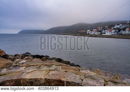 Ocean With Mountains In Fog In The Background. Picture From Molle, Scania County, Sweden