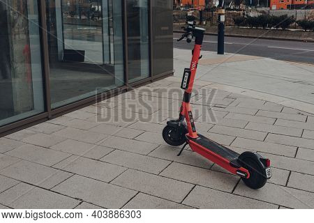 Birmingham, Uk - January 17, 2021: Voi Rental Electric Scooter On A Street In Birmingham, Uk. The E-