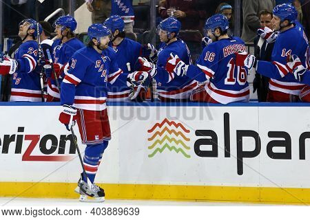 NEW YORK-APR 27: New York Rangers left wing Rick Nash (61) celebrates after scoring his second goal of the game against New Jersey Devil s at Madison Square Garden on April 27, 2013 in New York City.