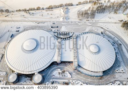 Top View In Winter Of A Modern Sports Complex With Parking In Minsk. Belarus