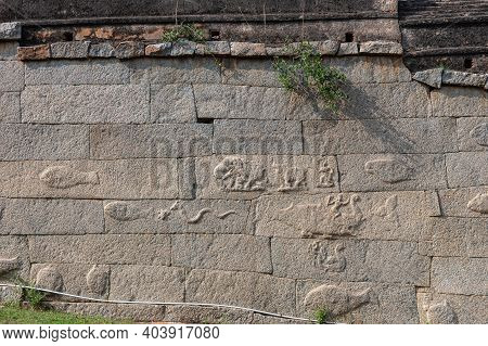 Hampi, Karnataka, India - November 5, 2013: Malyavanta Raghunatha Temple. Gray Outside Wall Features