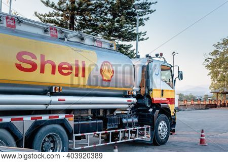 Chiang Mai, Thailand - Dec 15, 2020: Shell Gas Station And Trailer Truck During Sunset. Royal Dutch 