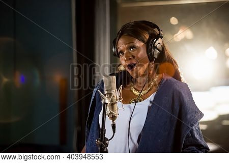 Waje Nigerian Singer Recording Vocal Part On Afro-pop Song In Studio