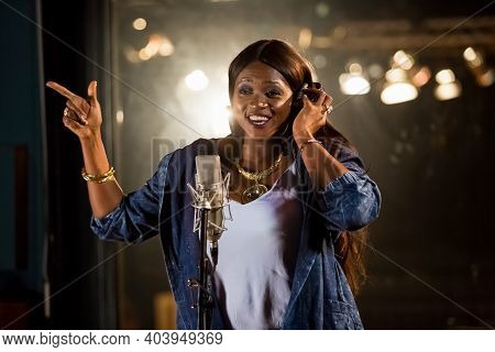 Waje Nigerian Singer Recording Vocal Part On Afro-pop Song In Studio