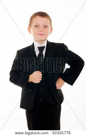 little boy in a black suit  on a white background