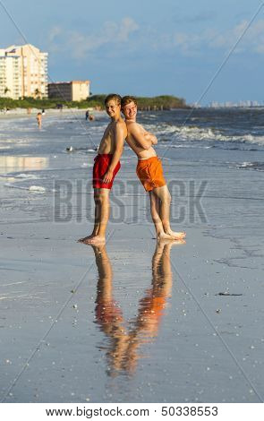 Teenager Enjoy The Sunset At The Beach
