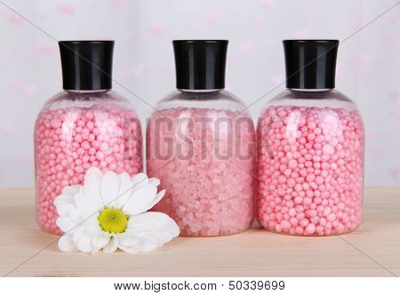 Aromatherapy minerals - colorful bath salt on light background