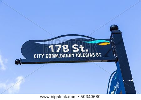 Typical Street Sign In Sunny Islands Under Blue Sky