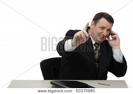 Portrait of smilling businessman using cell phone