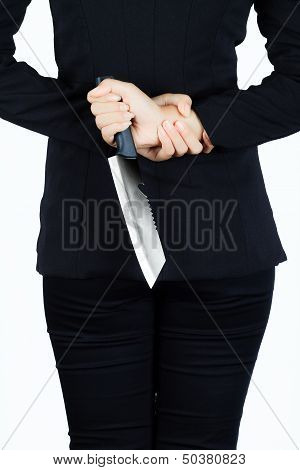 Back Of Business Woman With Aknife