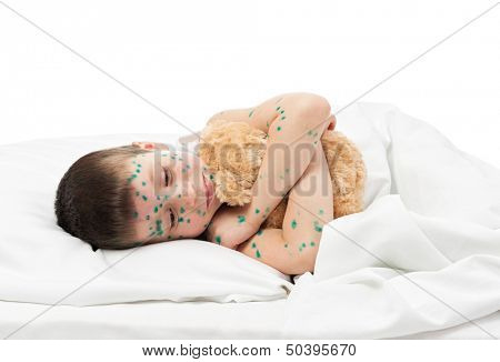 sick boy in bed