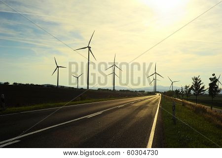 Wind Turbine At Sunset