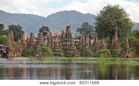 Ancient flooded pagodas in ruins near Samkar village on Inle lake, Shan state, Myanmar