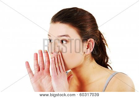 Youngwoman talking gossip, isolated on white background 