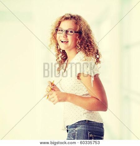 Beautiful corpulent caucasian student girl isolated on white background 
