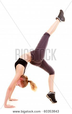 Young Sporty Girl Doing Stretching Exercise Isolated. Healthy Lifestyle