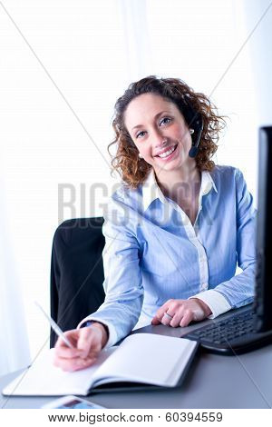 portrait of a beautiful young woman telephone operator