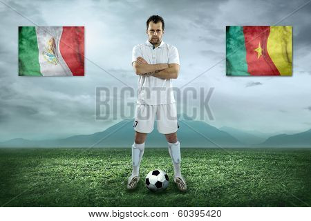 Soccer player stay at field. Game between Mexica and Cameroon national teams.