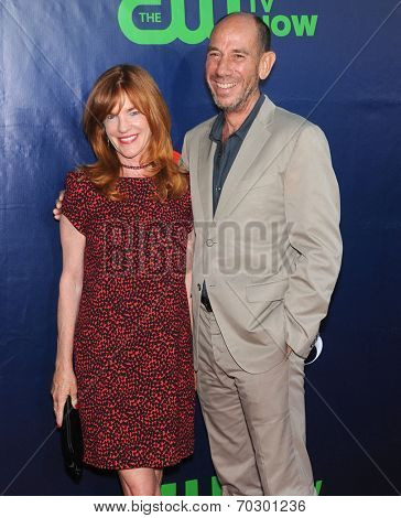 LOS ANGELES - JUL 17:  Miguel Ferrer & Lori Weintraub arrives to the CBS-CW-Showtime Summer TCA Press Tour 2014  on July7, 2014 in West Hollywood, CA.                