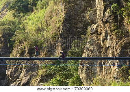 Working on Pipe Near Banos, Ecuador
