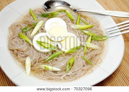 Noodle Soup With Boiled Egg Slices With Scallion