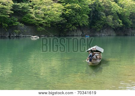 KYOTO, JAPAN - APRIL 26th  : The ferry of  Hozu(Katsuragawa) River in Arashiyama in Kyoto, Japan on 26th April 2014.