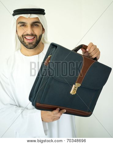 Arabic young businessman wtih briefcase