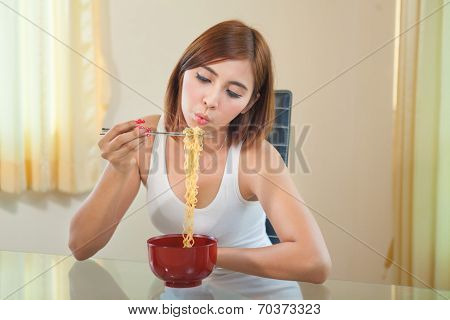 Young Girl Eating Ramen Noodles