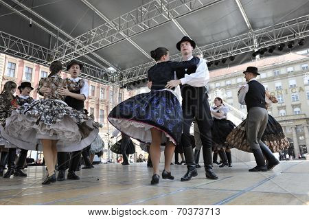 ZAGREB, CROATIA - JULY 19: Members of folk groups Nograd  from Salgotarjan, Hungary during the 48th International Folklore Festival in center of Zagreb, Croatia on July 19, 2014