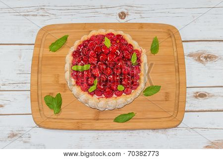 Raspberry Cake Decorated With Mint Leaves