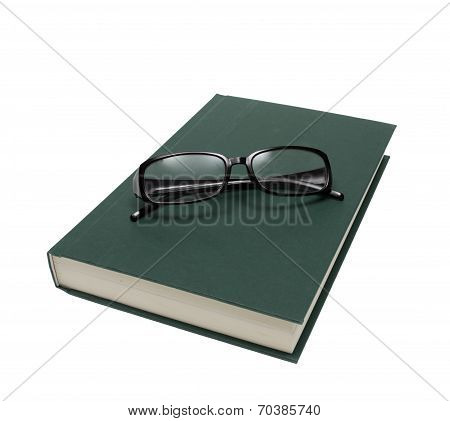 Reading Glasses On Book Isolated On White