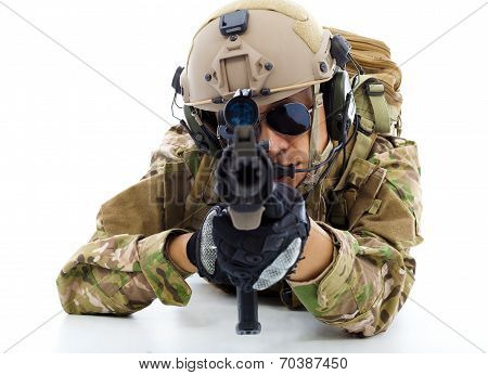Soldier With Rifle And Lying On Floor Over White Background