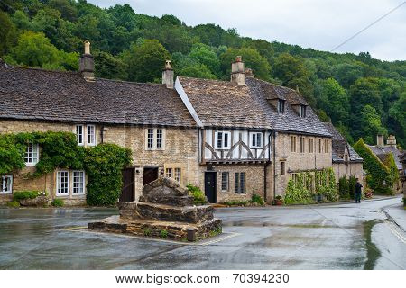 WILTSHIRE, CHIPPENHAM, UK - AUGUST 9, 2014: Castle Combe street, unique old English village