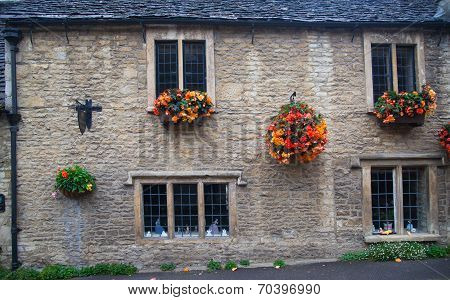 CHIPPENHAM, UK - AUGUST 9, 2014: Old house, Castle Combe village