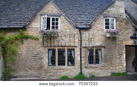 WILTSHIRE, CHIPPENHAM, UK - AUGUST 9, 2014: Old house in Castle Combe village