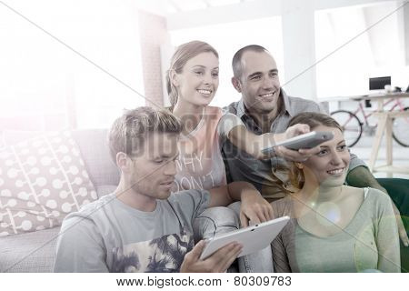 Roommates in apartment watching tv