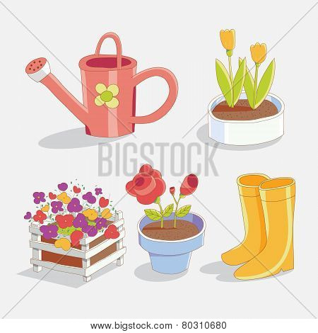 Garden tools and flowers in the pots