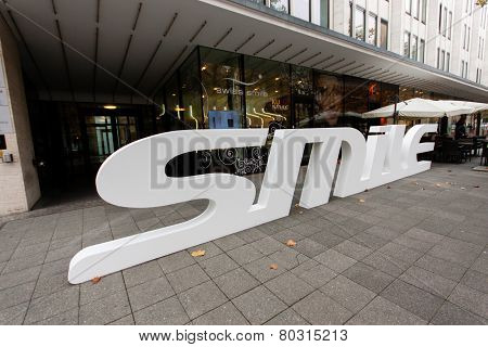 Berlin, Germany - November 12, 2014: Dental Care Shop Swiss Smile With 3D Logo On Pavement At Shoppi
