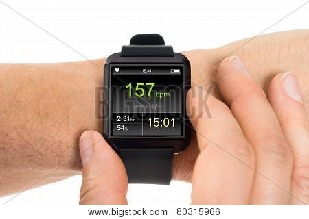 Human Hand With Smartwatch Showing Heartbeat Rate