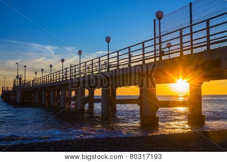 Sunset Through Pier