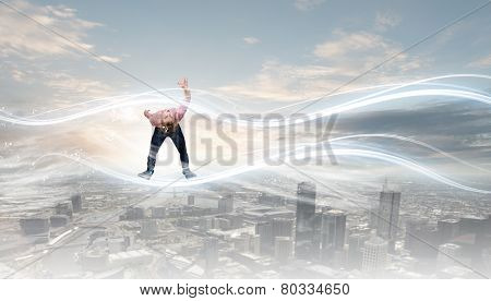 Young guy in casual evading from light rays