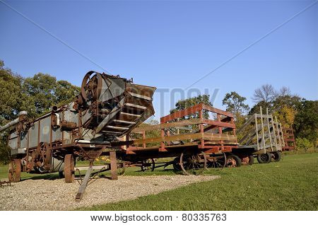 Threshing machine and hay racks