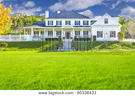 Beautiful Custom Built Home Facade and Yard.