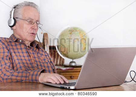 Senior Man With Laptop