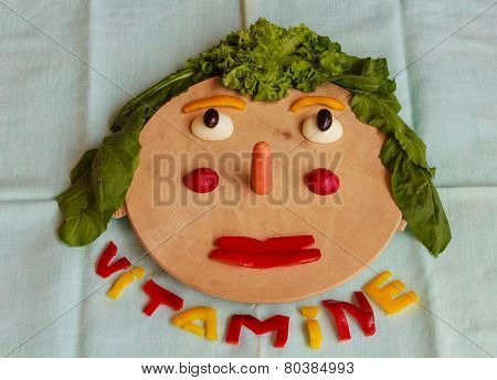 Cutting-board With Pieces Of Colorful Vegetables  On A Blue  Tablecloth