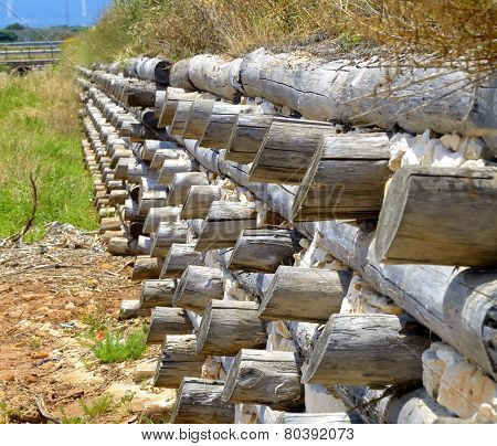 View levee channel trunks wood and stone