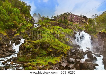 Famous waterfall Laatefossen in Hardanger Norway - nature and travel background