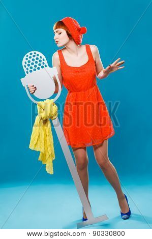 French woman wearing beret. blue background. microphone, singer,