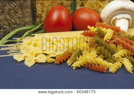 Various types of pasta on the table, homemade food preparation
