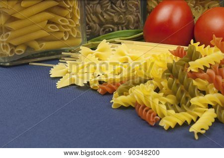 Various types of pasta on the table, homemade food preparation